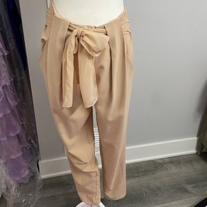 Very light peach trousers with tie detail